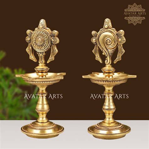 Brass Oil Lamp with Shankh and Chakra Design – Avatar Arts