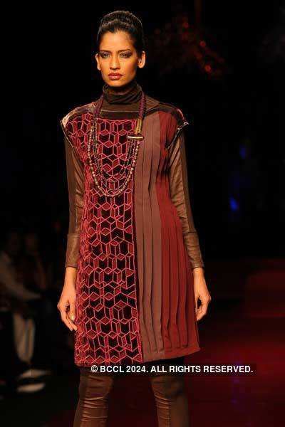 A model presents a creation by designer Ranna Gill during Day 4 of ...