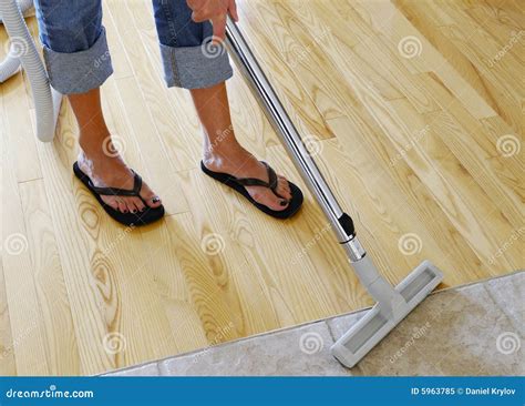 Vacuuming wood floor stock image. Image of hardwood, chores - 5963785