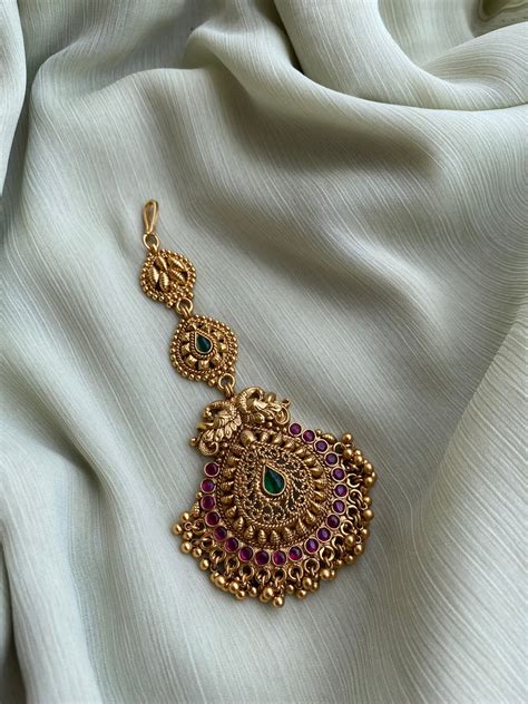 Big gold polish teeka – Daivik.in