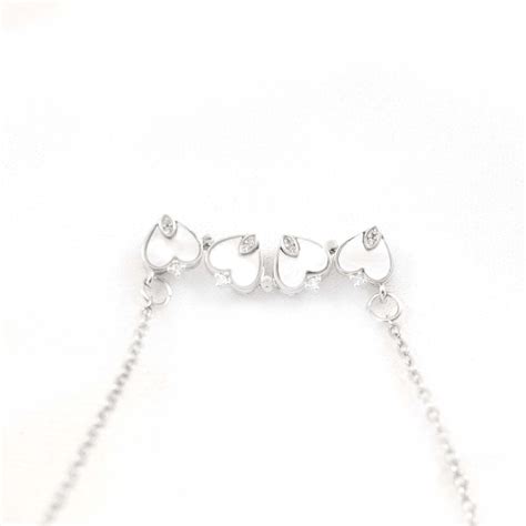 silver clover magnetic heart necklace | Salty – Salty Accessories