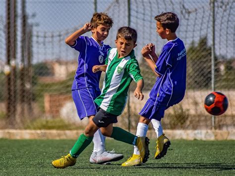 Kids Playing Soccer 的图像结果