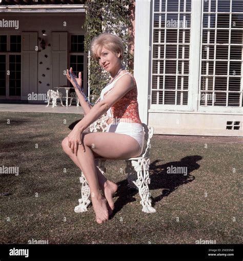Actress Susan Oliver poses outside her home in Beverly Hills, Calif ...