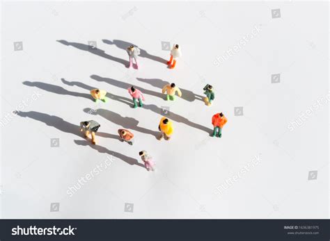 Small Group of People Standing 的图像结果