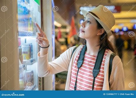 Buying Things from Vending Machine. Stock Image - Image of student ...