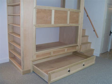 Built-In Bunk Beds with Bookshelves and Trundle Bed