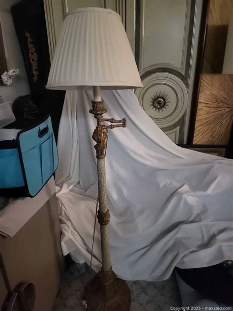 Tommy Bahama style swing-arm floor lamp | Maxsold