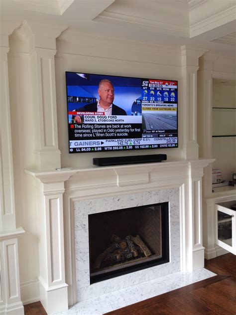 Tv Wall Mounted Over Fireplace at Jacqueline Sadler blog