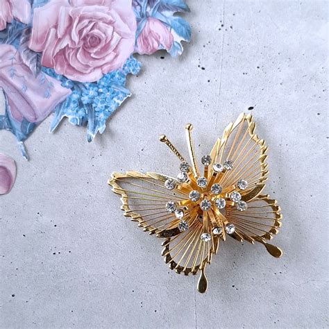 《MONET》 gold open wire work clear rhinestone burst butterfly vintage ...