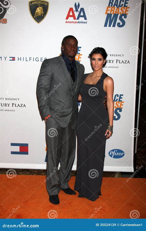 Reggie Bush,Kim Kardashian editorial stock image. Image of kardashian ...