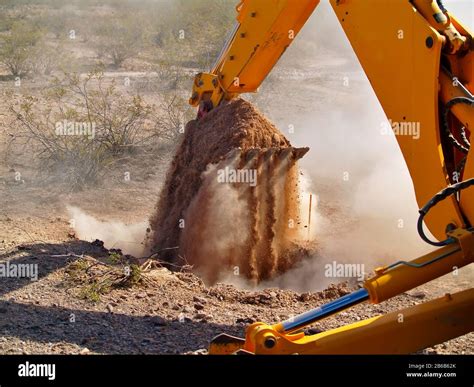 Image result for Backhoe Digging Hole