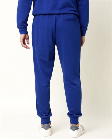 Rare Rabbit Men's Titan Blue Cotton Plain Regular Fit Joggers