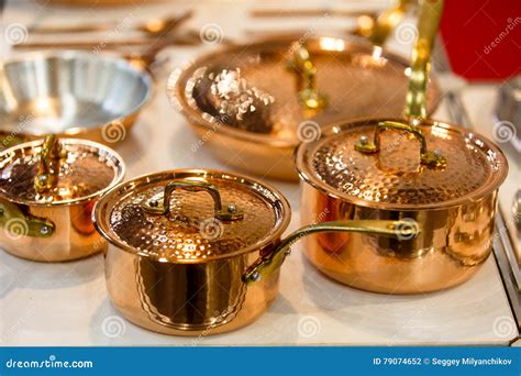 Copper Cookware, Pots and Pans are on the Counter in the Store. Stock ...