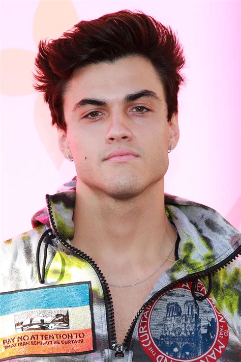 Ethan Dolan's 24 Tattoos & Their Meanings - Body Art Guru