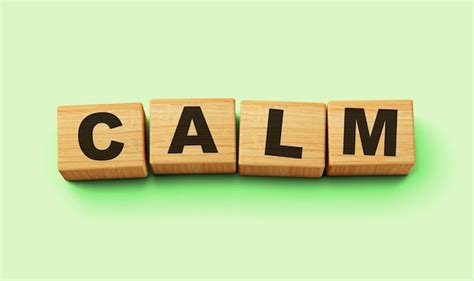 Premium Photo | Calm word written on wood block calm text on light ...