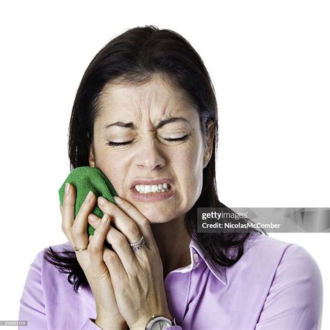 Holding Ice On Bruise High-Res Stock Photo - Getty Images