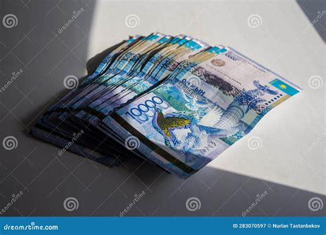Kazakhstani Currency Tenge in Denominations of 10,000 Tenge. Stock Image - Image of money, wing ...