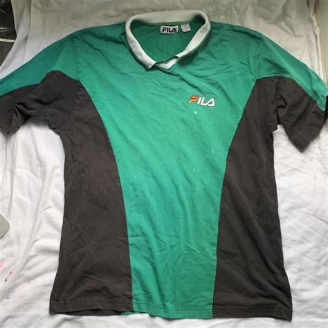 Fila green and black mens shirt some bleach stains... - Depop