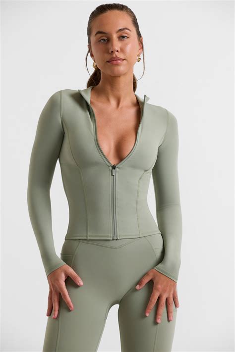Rally Zip Up Jacket With Side Pockets in Bamboo Green | Oh Polly