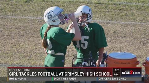 Teenage girl tackling stereotypes; playing football at Grimsley HS ...