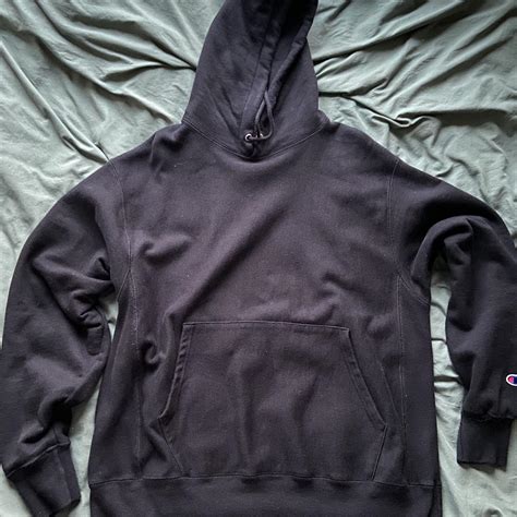 Black champion reverse weave hoodie size large Very... - Depop