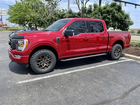 Factory 18s powder coated bronze + installed KO2 275/70r18 tires ...