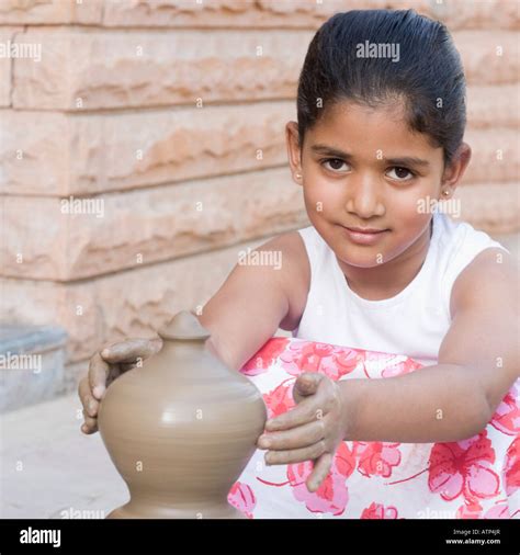 Portrait of a girl making a pottery Stock Photo - Alamy