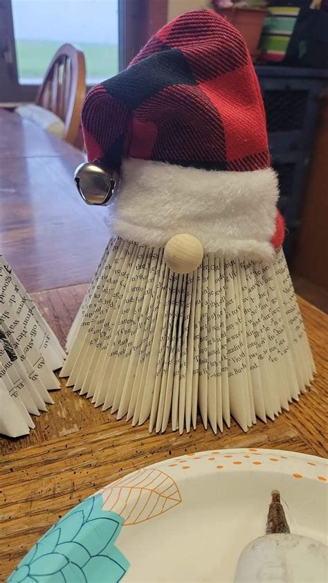Folded book gnomes. | Upcycled books crafts, Book crafts diy, Old book ...
