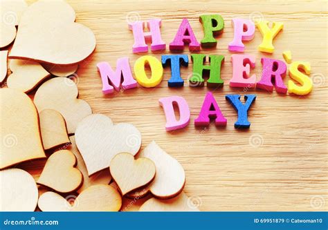 Happy Mothers Day Colorful Letters Spelling Greeting on Wood Table ...