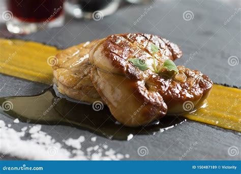 Fried Goose Liver. Foie Gras with Mango Puree Stock Image - Image of ...