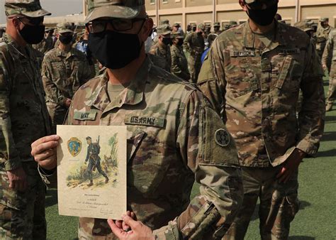 Camp Arifjan deployed Soldiers earn Norwegian Foot March badge under ...