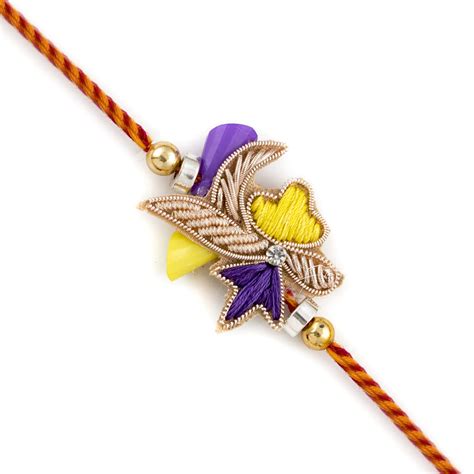 Aapno Rajasthan Charming Yellow and Violet Zardosi Rakhi