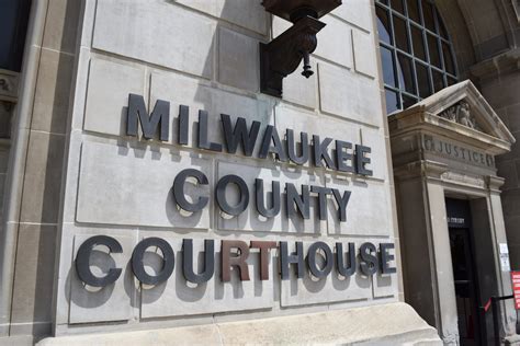 Milwaukee County judge charged with obstruction, accused of helping man ...