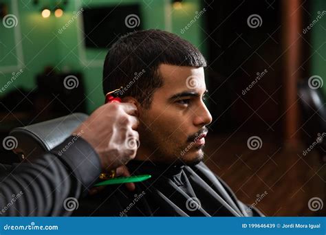 African-American Barber`s Hand Uses Razor and Haircut on Hispanic ...