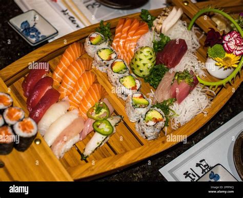 Sushi is a Japanese dish of prepared vinegared rice (sushi-meshi ...