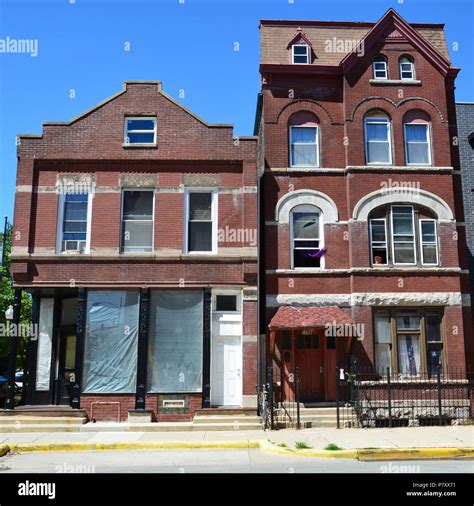 Tightly stacked turn of the century apartment buildings along 18th ...