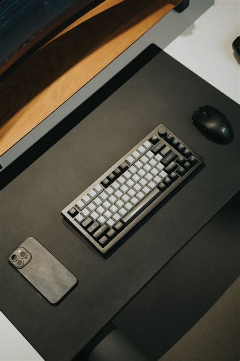 Modern Desktop Setup with Keyboard and Mouse · Free Stock Photo