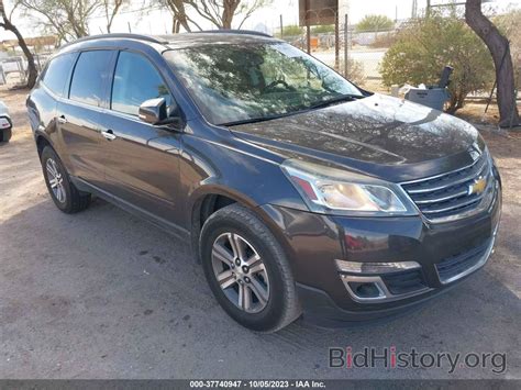 Report 1GNKRHKD4FJ159613 CHEVROLET TRAVERSE 2015 Gray Gasoline - price and damage history