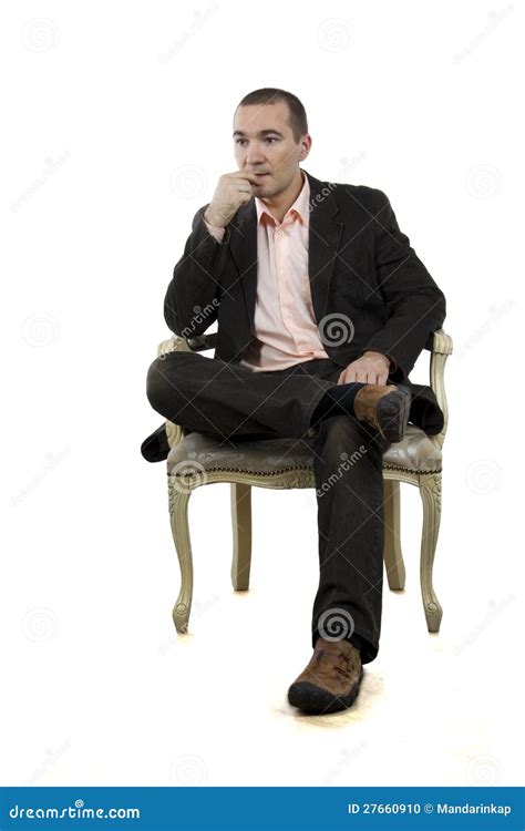 Man Sitting In A Chair In A Pose On A White Backgr Stock Photo - Image ...