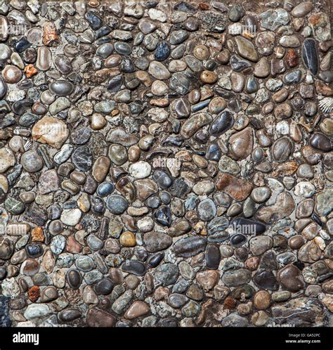 Pebble stone floor tile texture and seamless background Stock Photo - Alamy