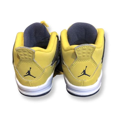 Black and yellow Jordan 4 toddler size 7c - Depop