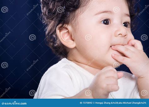 Baby suck thumb stock photo. Image of emotion, innocence - 7370892