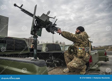 Member of the Mobile Air Defence Group Checks a DShK Machine Gun Atop ...
