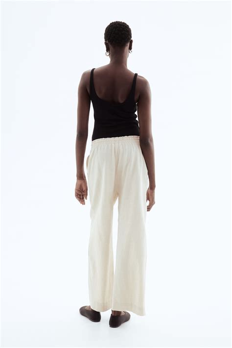 Cropped linen-blend trousers - Light beige - Ladies | H&M IN