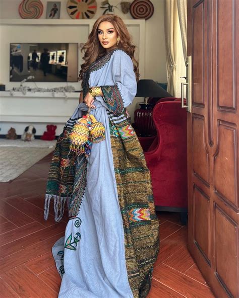 Unveiling the Azure Elegance of Habesha Dress in the Radiant Blue Raya ...