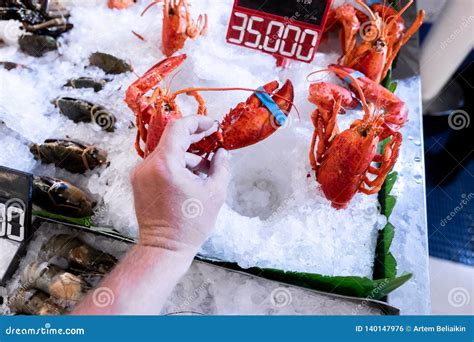 Fresh Lobsters in the Seafood Market. Lobster Store. Raw Seafood ...