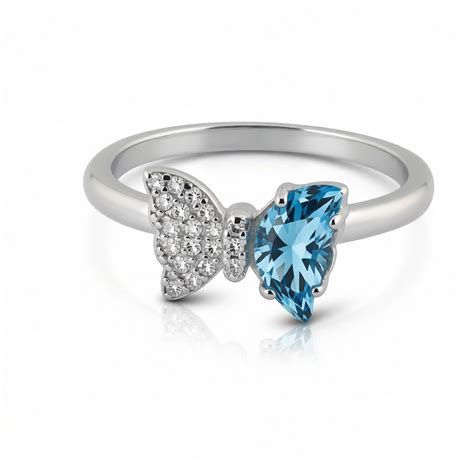 Bow Accent Ring – Sterling Silver with Blue Crystal & Pavé Details ...