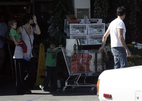 Candid Photos: Carrie Anne Moss Shops at Whole Foods Market with Family ...
