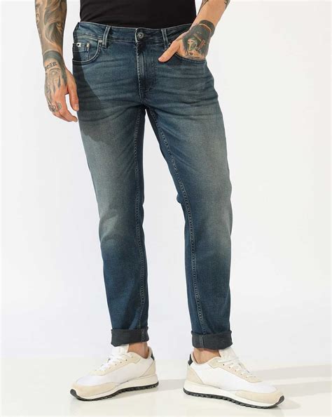 Mid-Rise Tapered Fit Heavy Wash Denim