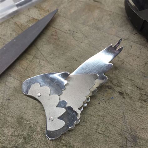 Image result for Winged Silver Magic Trick Tutorial